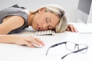 bigstock-Exhausted-woman-sleeping-in-fr-73500736-1-300x200
