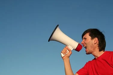 bigstock-Man-Shouting-Through-Megaphone-1502024