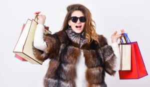 bigstock-Woman-Shopping-Luxury-Boutique-268696741-300x174